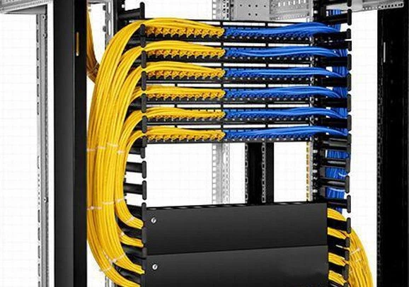 Channeling cables into RJ45 Keystone Jacks (standard Ethernet connectors) along parallel pathways, eliminating performance-degrading right-angle bends,Enabling scalable infrastructure through methodical port alignment. Channeling cables into RJ45 Keystone Jacks (standard Ethernet connectors) along parallel pathways, eliminating performance-degrading right-angle bends,Enabling scalable infrastructure through methodical port alignment.